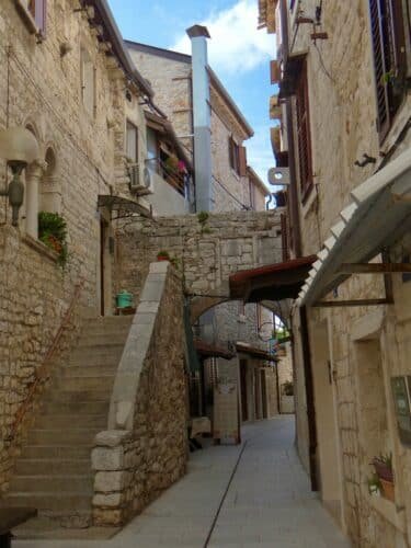 Charming narrow street in Umag Croatia